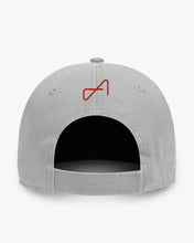 Load image into Gallery viewer, Back of light grey baseball cap with a Velcro back closure, featuring a small red embroidered logo.