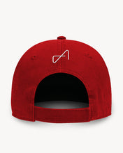 Load image into Gallery viewer, Back of red baseball cap with a Velcro back closure, featuring a small white embroidered logo.