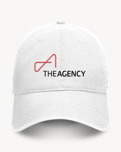 Load image into Gallery viewer, A white baseball cap with a red and black logo of 'THEAGENCY' on the front.