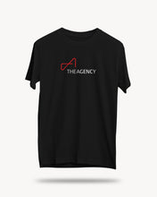 Load image into Gallery viewer, A black unisex crew neck t-shirt with a logo of 'THE AGENCY' printed in white on the front.