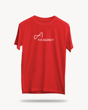 Load image into Gallery viewer, A red unisex crew neck t-shirt with a logo of 'THE AGENCY' printed in white on the front.